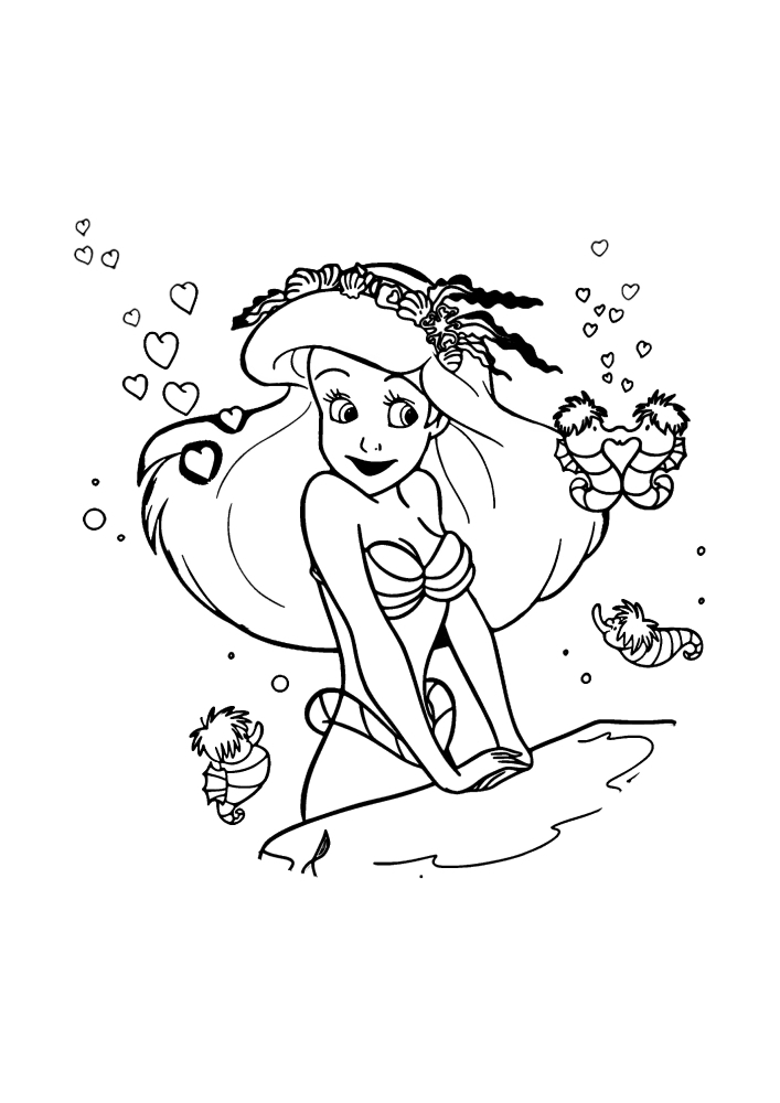 A Pequena Sereia Ariel e o mundo subaquático.