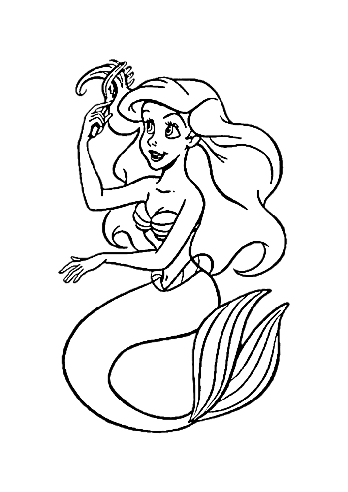 Ariel y la estatua de piedra de su Príncipe-libro para colorear