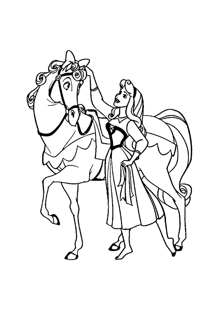 Aurora streichelt ihr Pferd.