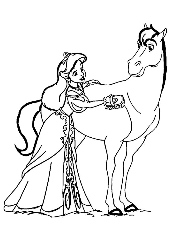 Ariel putzt das Pferd.