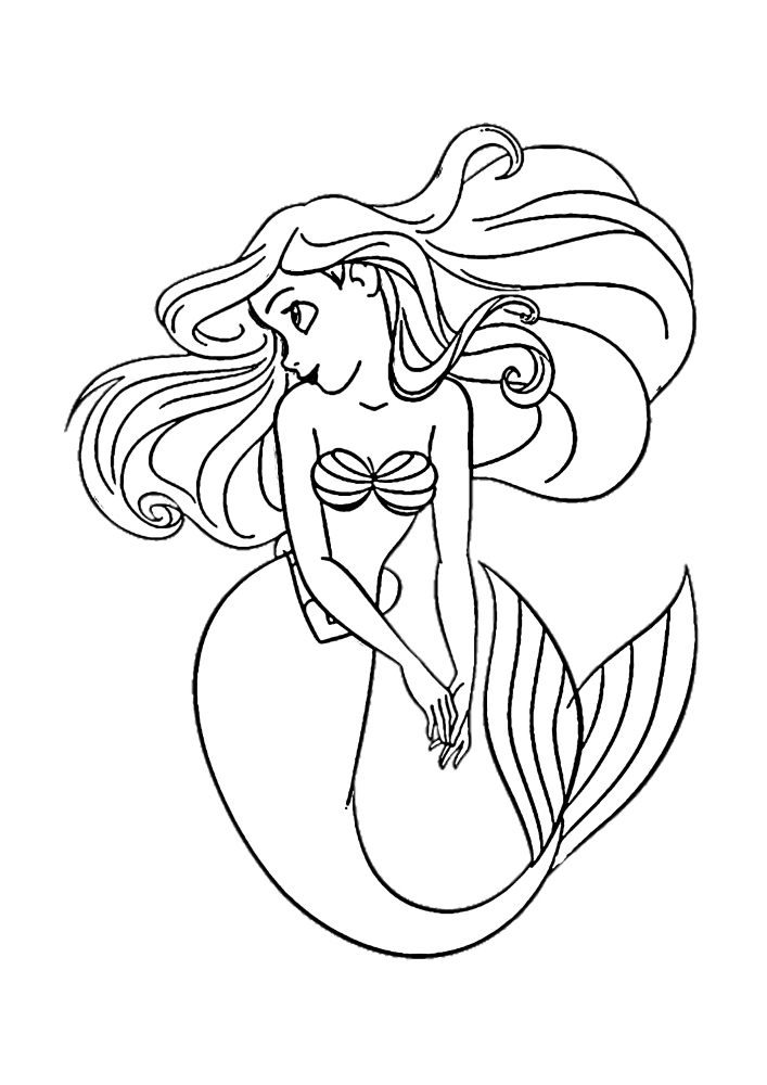 Ariel flotte à la surface.