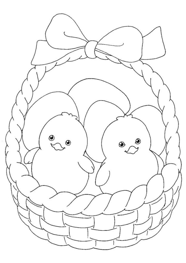 Easter basket with chicks and eggs