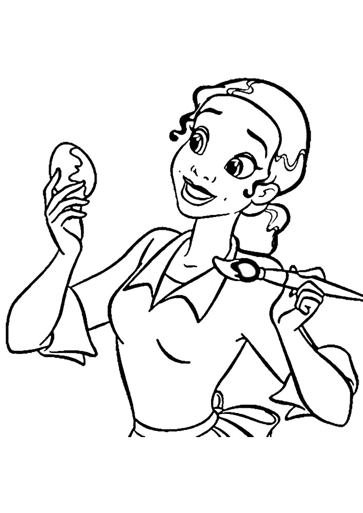 Menina feliz colorindo ovo de Páscoa