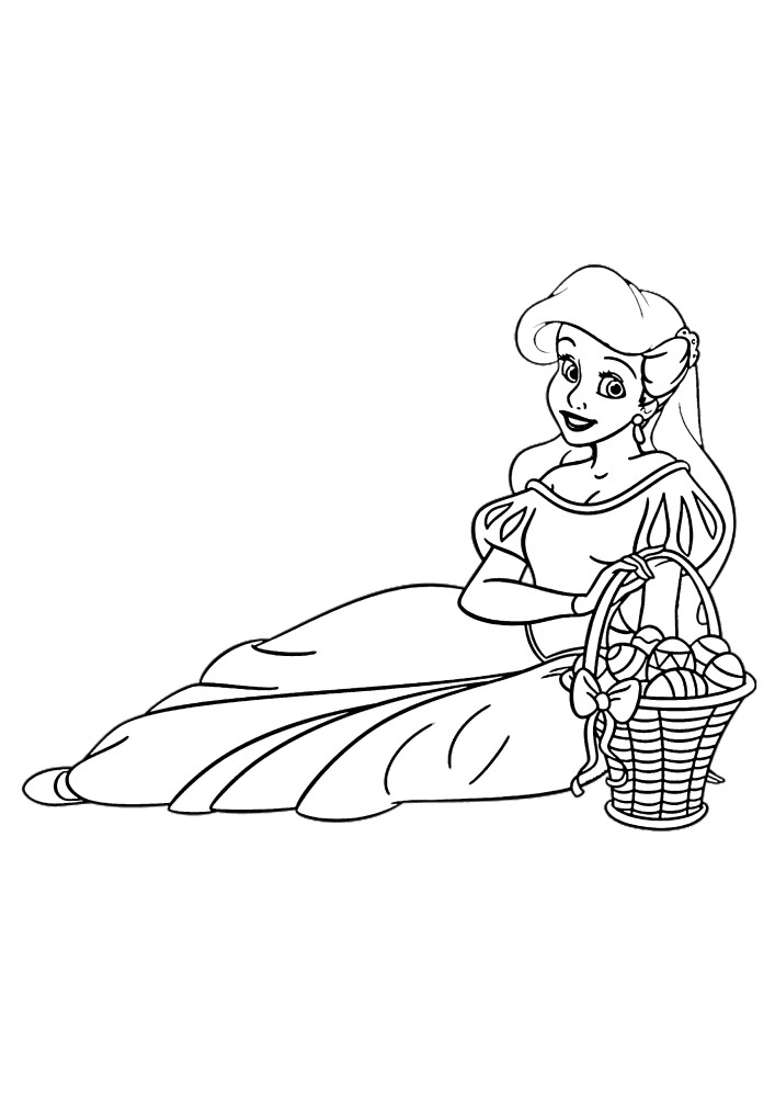 Ariel et un panier avec des oeufs pour Pâques