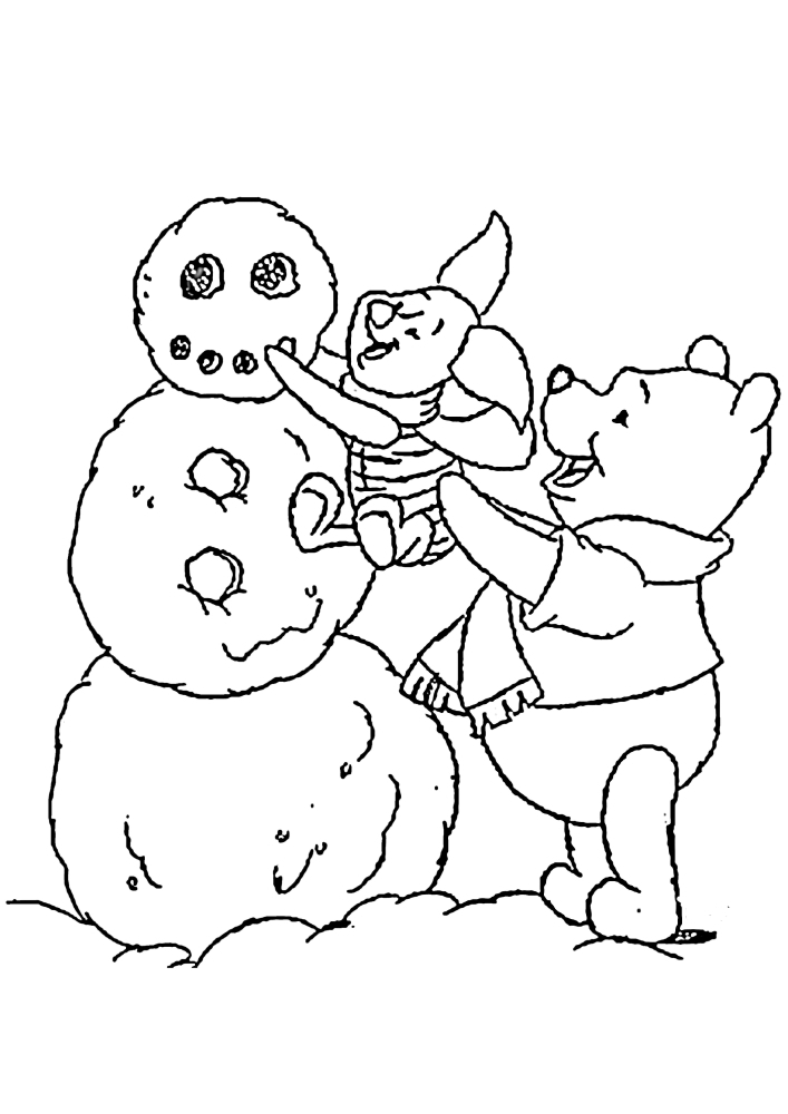 Winnie tient le talon pendant qu'il corrige le bonhomme de neige